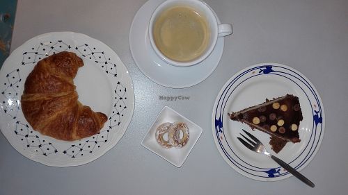 Coffee and vegan cake and croissant at VegaVerso in Leuven