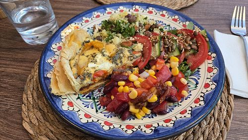 Vegetarian quiche with salad at Samarkind Cafe in Samarkand