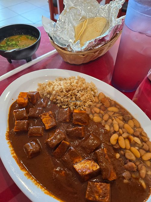 Vegan tofu mole with beans and brown rice, tortillas. at La Flor De Loto in South Gate