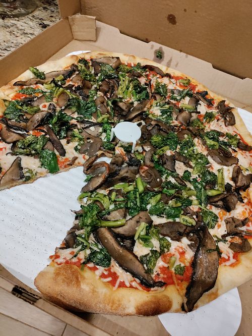Red sauce, vegan cheese, portobello mushroom, and broccoli rabe at Genna Pizza Company in Melbourne