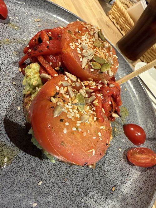 avocado on toast with red pepper and tomato  at Glebe Farm Shop & Tea Room in Kettering