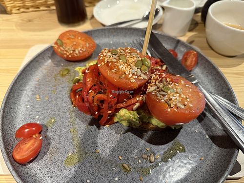 avocado on toast with red pepper and tomato  at Glebe Farm Shop & Tea Room in Kettering