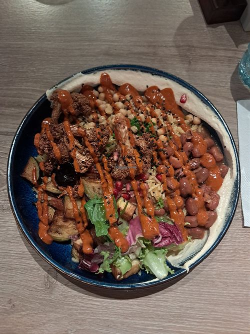 Vegan lab with fries cauliflower, eggplant and chickpeas at Tawook Lab Kluuvi in Helsinki