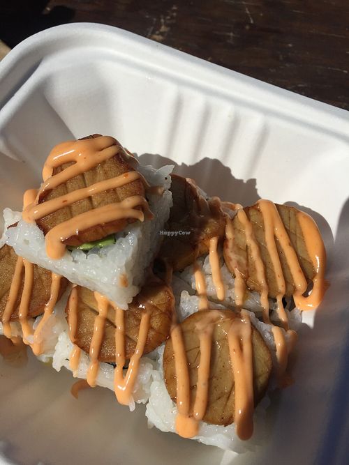 Don't be Shellfish roll -1 piece already devoured. Avocado, cucumber, oyster mushroom, spicy mayo. Yum. at Sushi Love in Portland