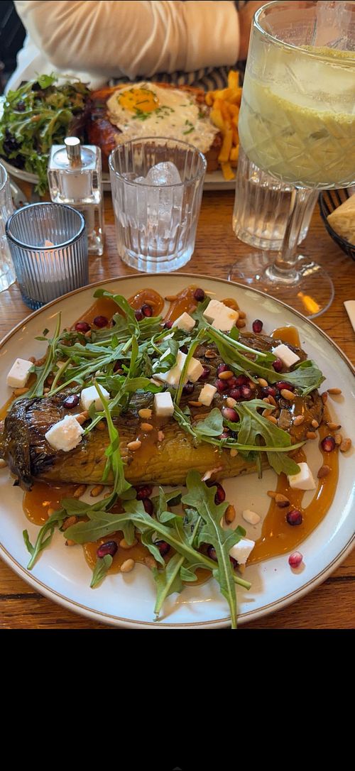 Eggplant dish with vegan feta. Matcha with oat milk.  at Café Madame in Ile-de-france