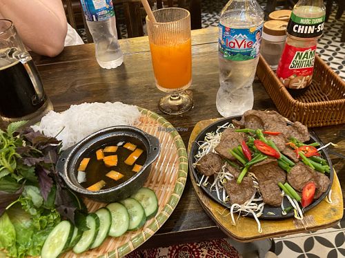 Vegan hotpot, juice and water at Co Vietnamese Restaurant in Hanoi
