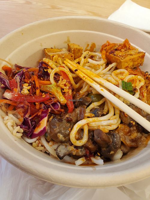 Rice noodles, brown rice, BBQ tofu, bell pepper, mushroom, veg mix, chili crisp. at RICEMILL in Phoenix