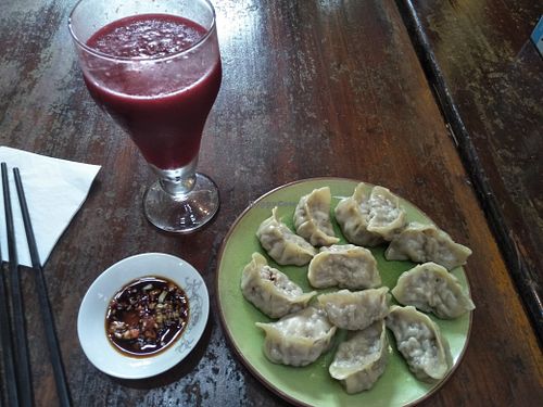 Vegan dumplings and beetroot ginger drink. at Mood Food Energy Cafe in Yangshuo