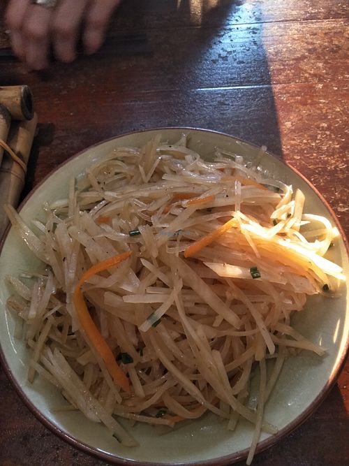 Spicy potatoes. at Mood Food Energy Cafe in Yangshuo