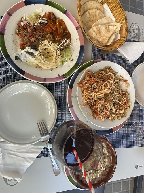We asked for the vegetarian combo and they made it vegan! Then there is foul medames and koshari (egiptian street food). We had two glasses of hibiscus (Karkade)  at El Nilo - Egyptian Food & Shisha Lounge in Barcelona