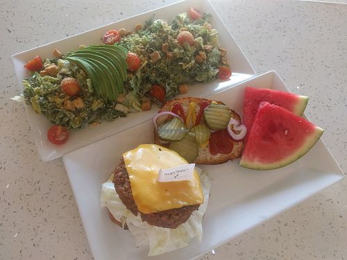 Ceasar Salad with Substitute Avocado anf Classic Cheeseburger at JOi Café in Westlake Village