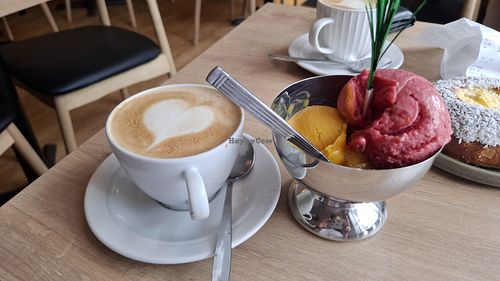 coffee with oatmilk and vegan sorbet at Koseverden&KoseligCafe in Tromsoe