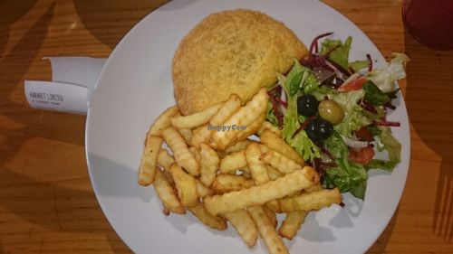 Jamaican Patti with chips and salad  at Karamel in North London