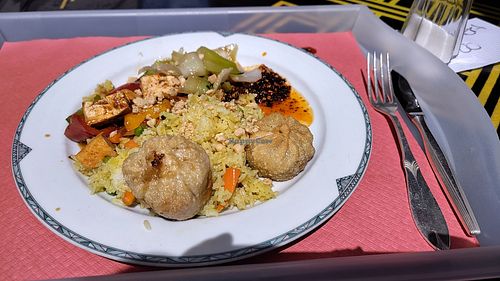 Buffet plate with momos, tofu, rice and vegetables at Little Tibet Restaurant I Take Away I Shop in Olten