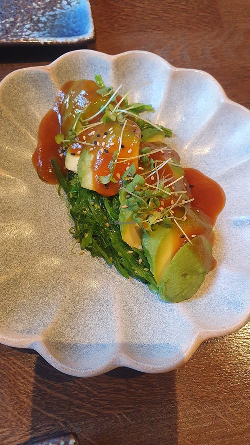 Avocado sashimi with wakame salad at An Vegan Restaurant in Karlsruhe