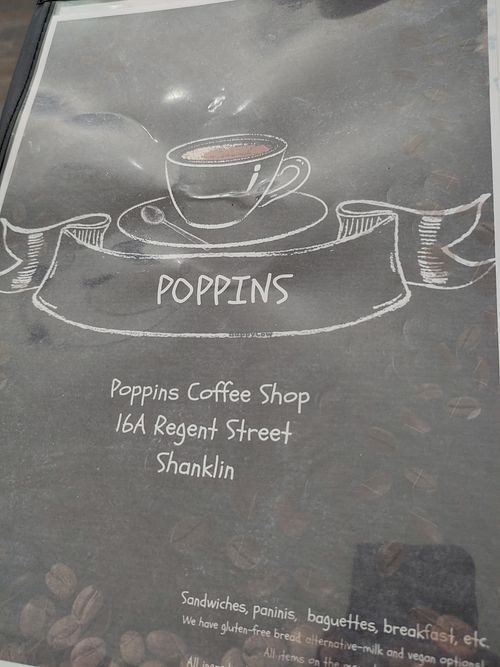 Menu cover with note about no bacon served. at Poppins in Shanklin
