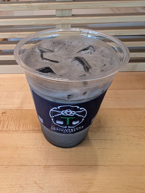 Black sesame latte with oat milk at TOKUYAMATCHA & ONIGIRAZU BAR SoHo in New York City