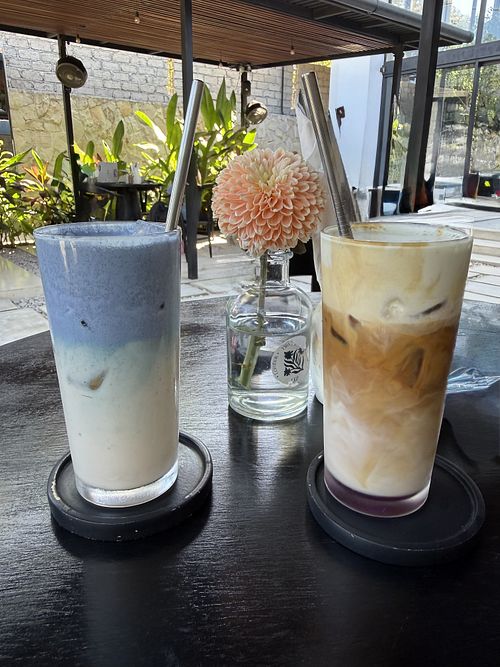 Blue matcha Smurf & pistachio lavender latte w oat   at OZ restaurant in Kuta