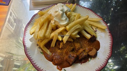 Currywurst and fries at Oder Wat Imbiss in Zurich