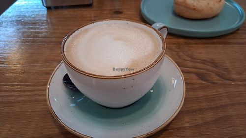 Coffee with oat milk at Lúcuma in Barcelona