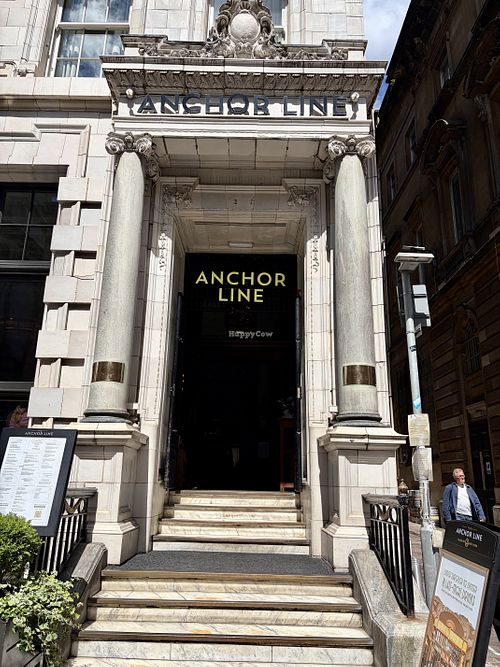 Entrance alongside outside seatingg  at The Anchor Line in Glasgow