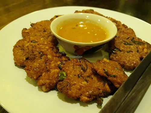 Savoury cakes with peanut sauce at May Kaidee Chiang Mai in Chiang Mai