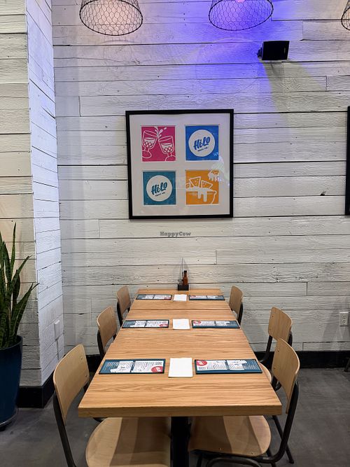 Nice artwork and tables that seat up to 6.  at Hi-Lo Taco Co. in Philadelphia