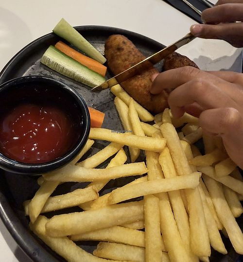 Kids veggie sausage and chips  at Caraway Cafe - Finest Indian Vegan & Vegetarian Cuisine in Gerrards Cross