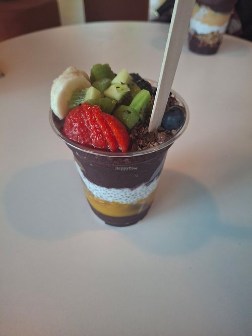 Açai "Bowl" with Mango puree, chia-seed pudding, cocoa nibs and fruit topping at OAKBERRY AÇAÍ - East Side Mall  in Berlin
