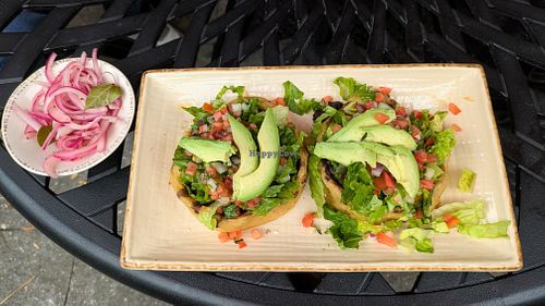 Sopes La Maria! Thick corn tortilla cups, no cheese/crema, refried/black beans, avocado, pico de gallo, & lettuce. Ask for hot sauce & pickled onions to maximize flavor!  at Manolete's Cocina Gourmet in Winchester