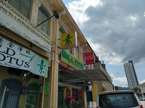 Gold lotus next to tanny at Gold Lotus Vegetarian Restaurant in Penang