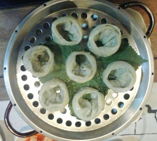 Tasty steamed dumplings served with daikon kimchi and fried beancurd at Dajeon Cafe in Busan