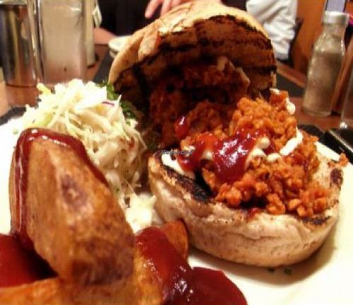 sloppy jo: slow cooked soy protein on a toasted whole wheat bun with special sauce. includes potato wedges and coleslaw at Karyn's Cooked in Chicago