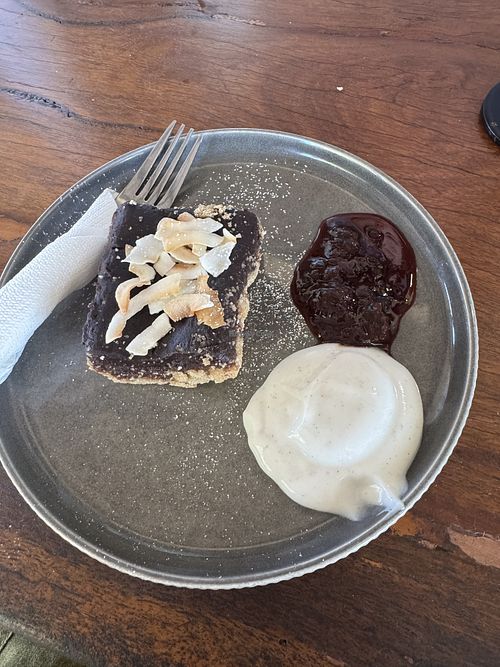 Caramel slice with coconut yoghurt   at Zulaybar Café in Broome