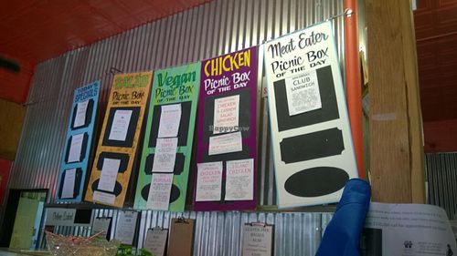 Menu board. There are also homemade tortillas here for sale! at Park Island Market and Cafe in Hot Springs