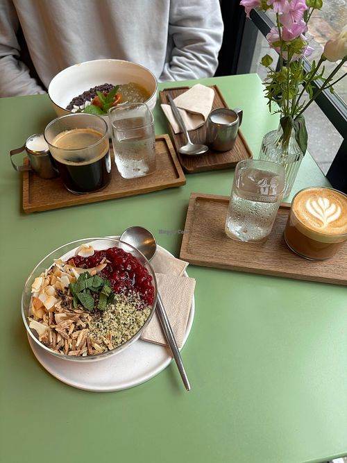 Vegan Chia Porridge and Black Rice Porridge, Oat Milk Cappuccino at Emma Emma in Aarhus