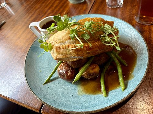 Wild mushroom, sweet potato, chestnut, spinach & kale Wellington with gravy.   at The Devonshire in Grassington