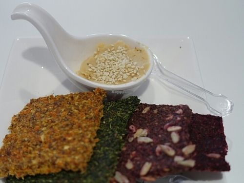 Dehydrated flaxseed cracker with dip at Daily Juice in Central Singapore