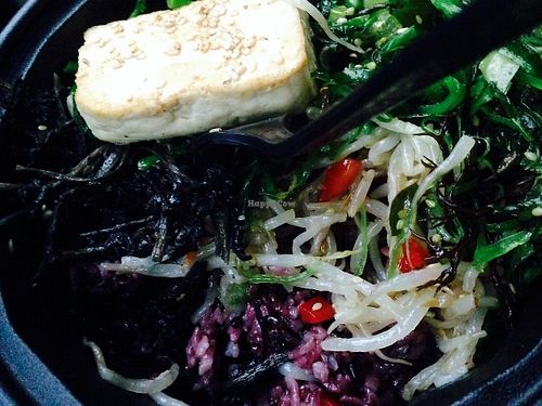 One possible bibimbap with seaweed, bean sprouts, watercress and wild greens over black rice at Triple B Fresh in Washington