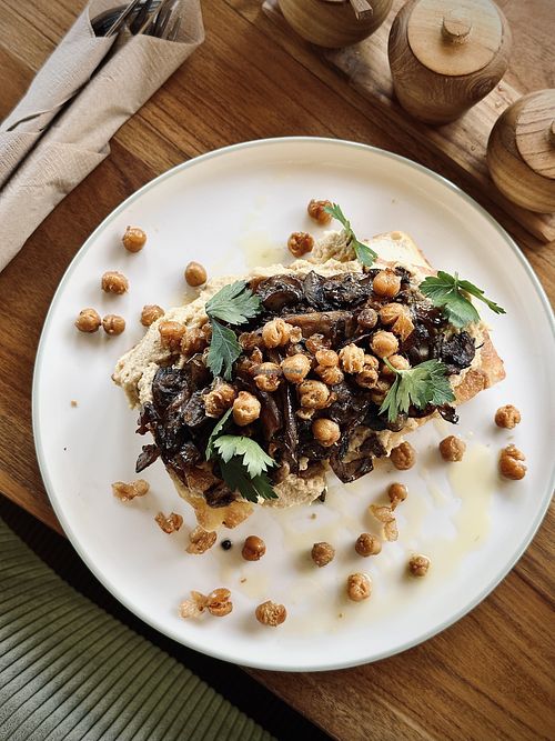 Foccacia with Hummus, Mushrooms & baked Chickpeas  at Paon by Together Bali in Pecatu