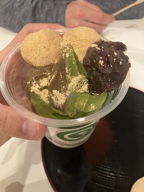 Vegan matcha and hojicha swirl soft serve with mochi and red bean paste on top   at Charyū par Thés Guru in Montreal