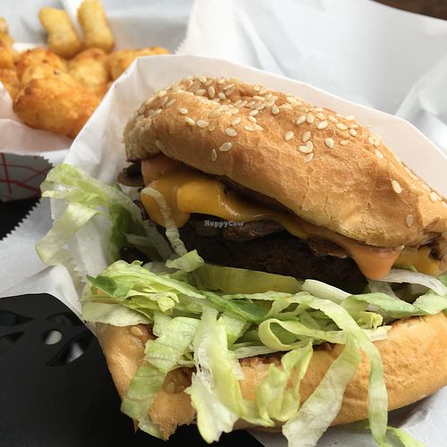 Melted Mushroom Burger and tater tots! at No No Burger - Food Truck in Oakland