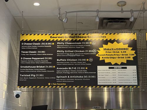 Vegan cheese option marked as an add on.   at Twisted Grilled Cheese (POST Houston) in Houston