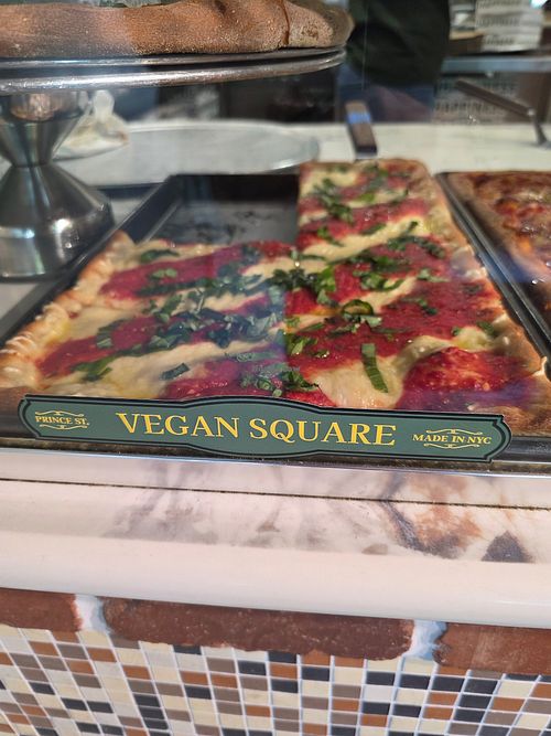 Vegan square pizza, actually good, dont know ow what cheese it is but on a pinch it worked out at Prince Street Pizza in Chicago