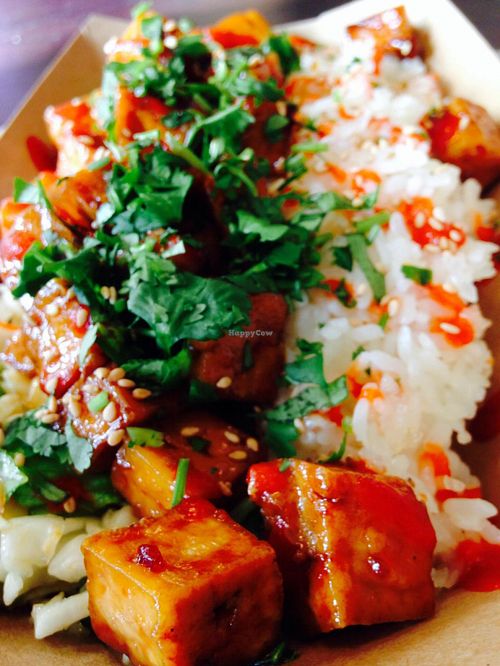 Half napa-romaine slaw half rice caramelized tofu bowl at TaKorean - 4th St in Washington