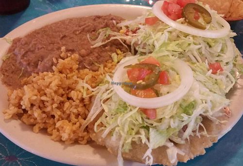 Vegan Puffy Tacos lunch special. 2 tofu puffy tacos with 2 sides (brown rice and pinto beans). $7.45 includes iced tea or coffee at La Fiesta Patio Cafe in Universal City