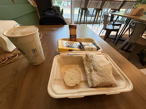 Latte, sweet flakey treat with GUAVA FILLING?!  at El Cerro in Seattle