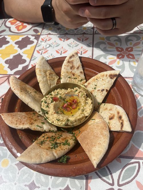 Hummus and bread   at BLUE MAN in Brighton