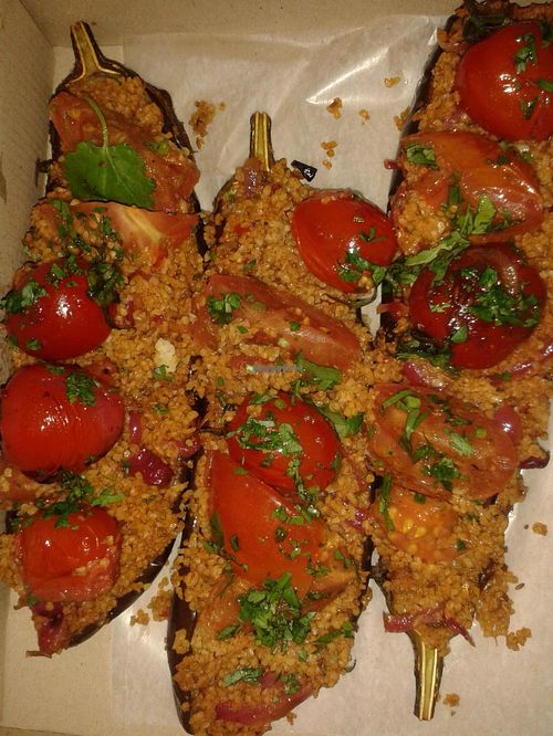 I bought these as a take out lunch. Baked eggplant with a bulgar wheat and chermoula stuffing. Yum. at River Kitchen in Hamilton