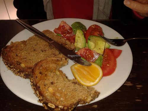 Avocado and tomato nine grain toast for breakfast. One of the vegan options. at River Kitchen in Hamilton